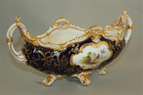 A fine Coalport boat shaped two handled vase, early 19th century, 33cm